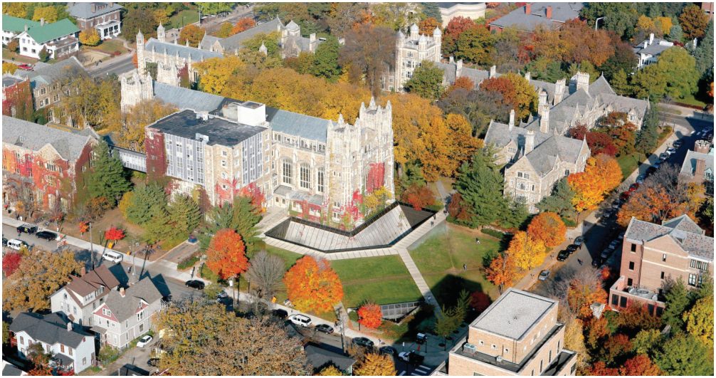 Aerial view of the Law Quadrangle in autumn, showing the Gothic buildings around an open lawn